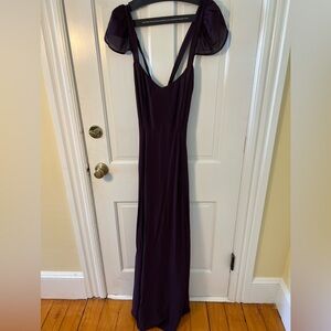 The Reformation burgundy elegant maxi dress with sheer shoulders and mid-back.